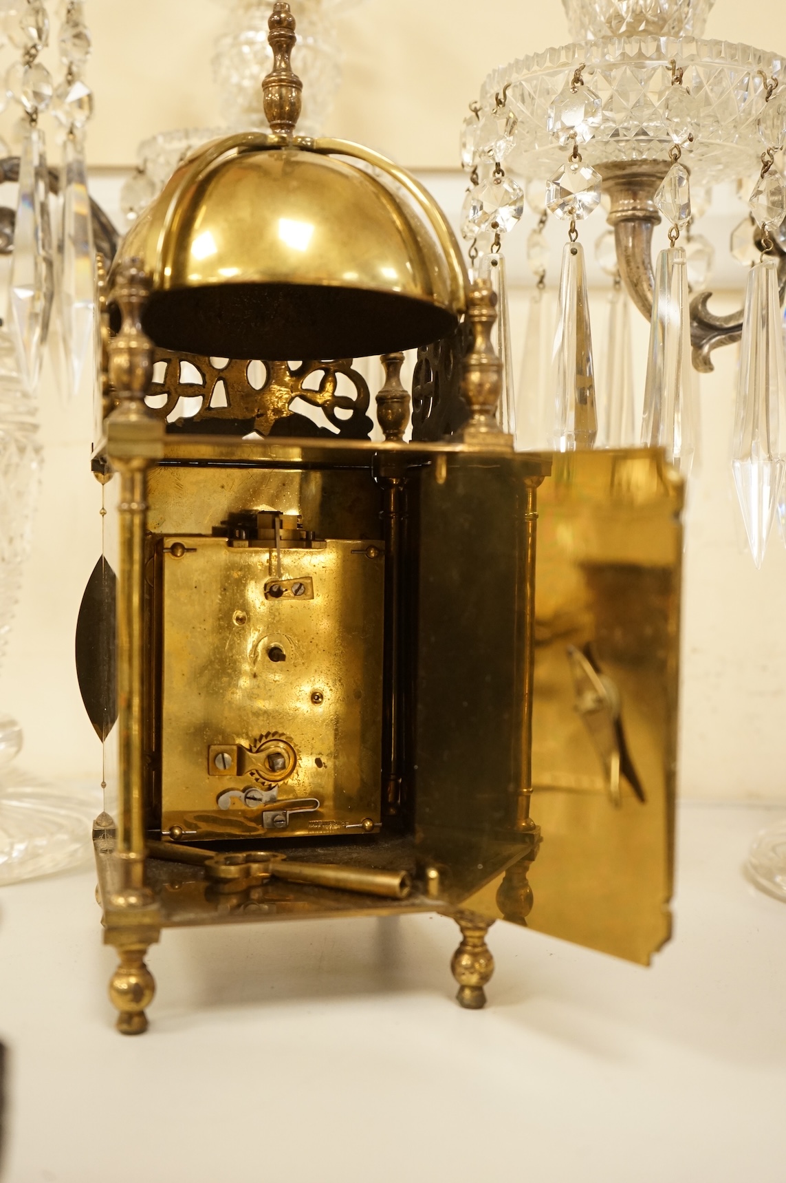 A small brass lantern clock, 26cm high